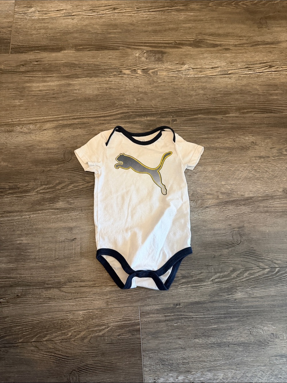 Puma White Bodysuit‎ with Navy Trim and Yellow Logo